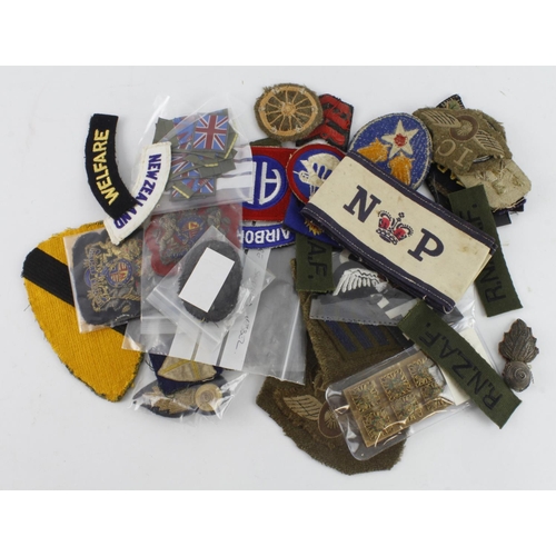 273 - Ex dealers Job lot of cloth badges and insignia.