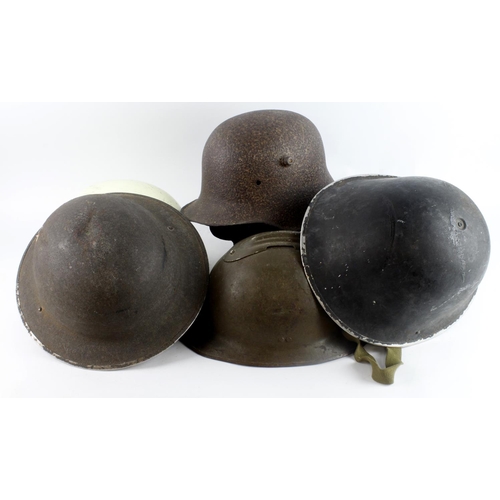 372 - Relic WW1 & WW2 helmets, various, plus a post war Red Cross helmet  (6)   Buyer collects