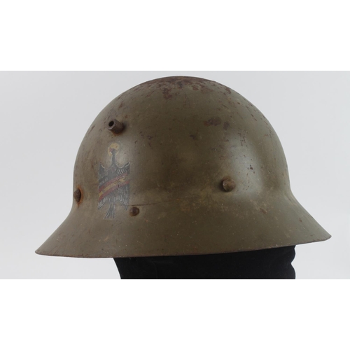 389 - Spanish Civil War Czech M30 Helmet with insignia of Franco’s Fascist 46th Infantry Badge. No liner.