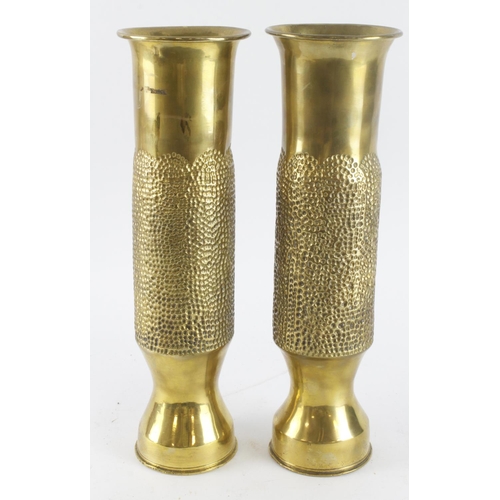 404 - Trench Art, a fine pair of vases made from French 75 (?) shell cases. Approx 34cm tall, well pricker... 