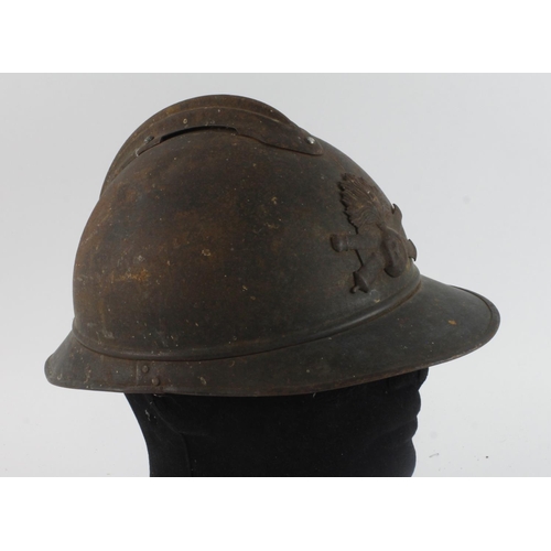 463 - WW1 French Adrian pattern helmet with some original blue paint, no lining or chin strap.