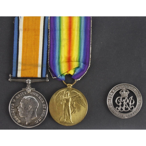 697 - BWM & Victory Medal (217275 Gnr W Harvey RA) with Silver War Badge B14325 for Wounds, discharged fro... 