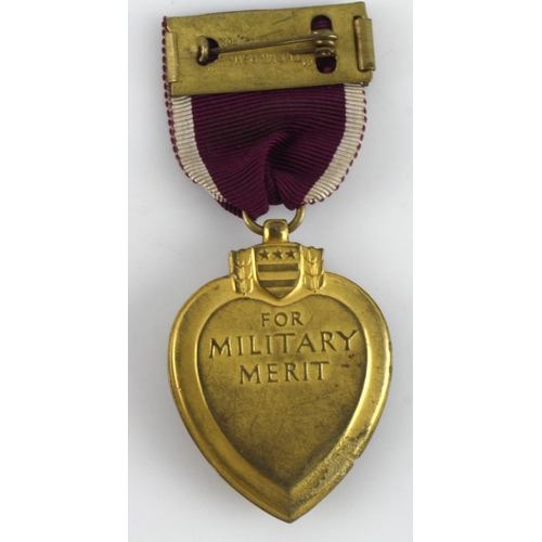 951 - US purple heart medal award to casualties of war possibly post WW2 issue.