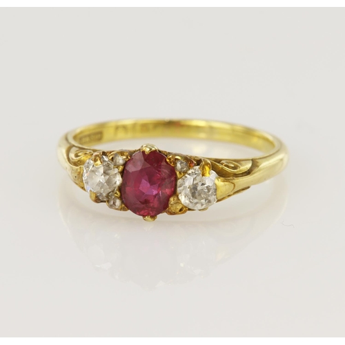 10 - Yellow gold (tests 18ct) antique diamond and ruby trilogy ring, oval ruby measures 6 x 4.5mm, two ol... 