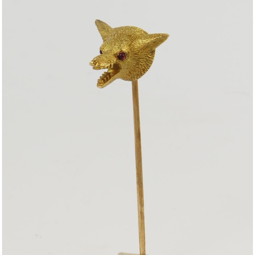 405 - Yellow gold (tests 18ct) antique fox head tie pin, ruby set cabochon eyes, head width 10mm, yellow g... 