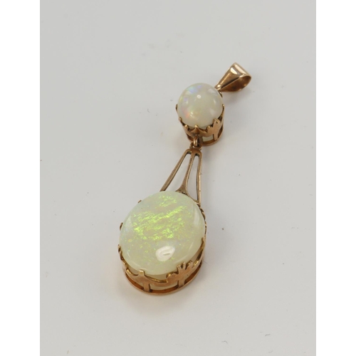 489 - Rose gold (tests 9ct) vintage opal pendant, opals measure 17 x 12mm and 8 x 8mm, total length 55mm, ... 