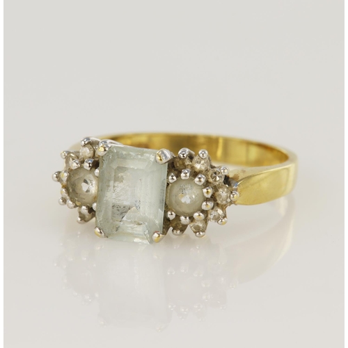 55 - 18ct yellow gold diamond and aquamarine dress ring, principle aquamarine measures 8 x 6mm, fourteen ... 