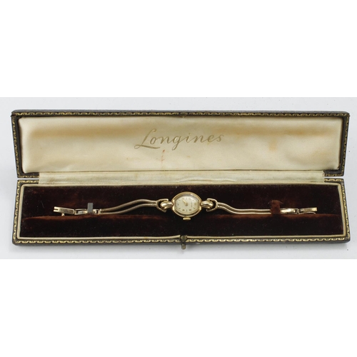 606 - Ladies 9ct cased Longines manual wind wristwatch, circa 1951. The creamed dial with gilt Arabic and ... 