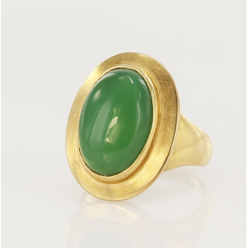 70 - Yellow gold (tests 18ct) chrysoprase dress ring, oval chrysoprase measures 15 x 10mm, bezel set with... 