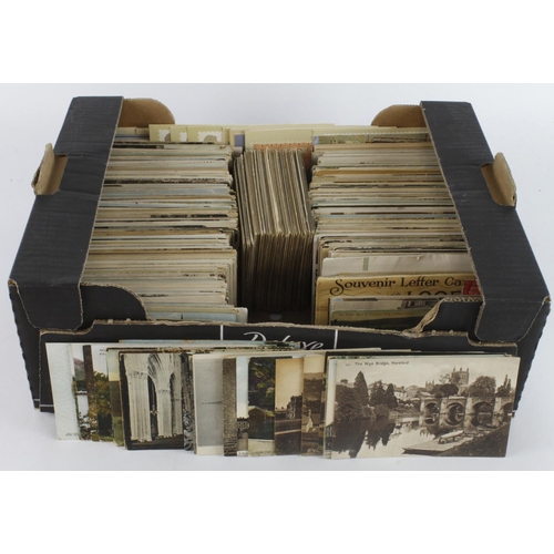 770 - Small black banana box crammed with mixed old postcards  (many 100's)  Heavy