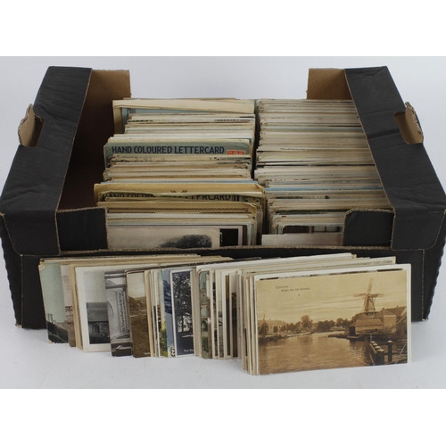 771 - Small black banana box crammed with mixed old postcards  (many 100's)  Heavy