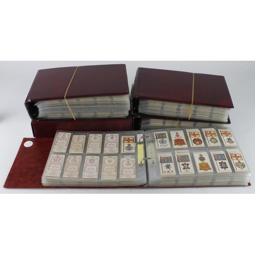 881 - Military interest cards, very large quantity contained in 5 modern albums, approx 46 complete sets c... 