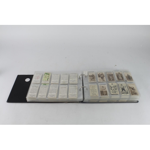 911 - Sport related, quantity of cards (no football or cricket) contained in a modern album, approx 8 comp... 