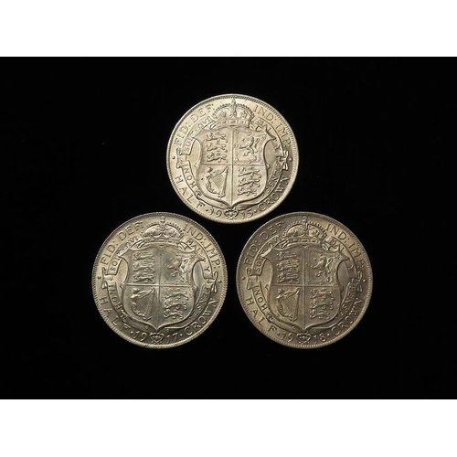 203 - Halfcrowns (3): 1915 EF, 1917 aEF, and 1918 EF