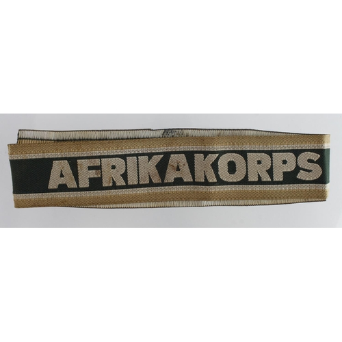 1207 - Germany from a one owner collection, an Afrika Korps breast eagle and cuff title.