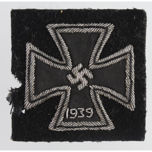 1220 - Germany from a one owner collection, an Iron Cross a cloth WW2 1st class on black Panzer backing.