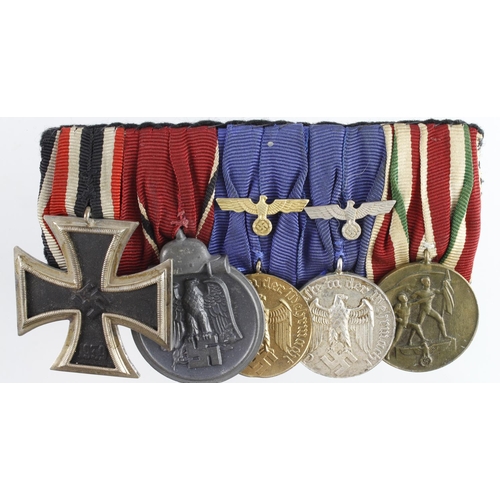 1221 - Germany from a one owner collection, an Iron Cross WW2 grouping, 2nd class, 3x piece made, a Russian... 