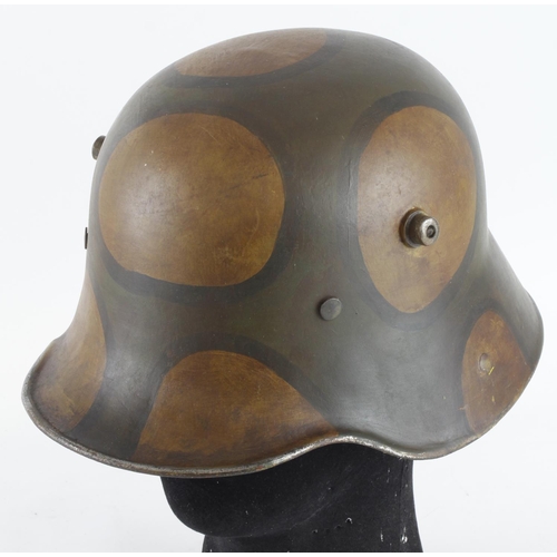 1257 - Imperial German M16 Combat steel helmet. Camo painted, complete with liner.