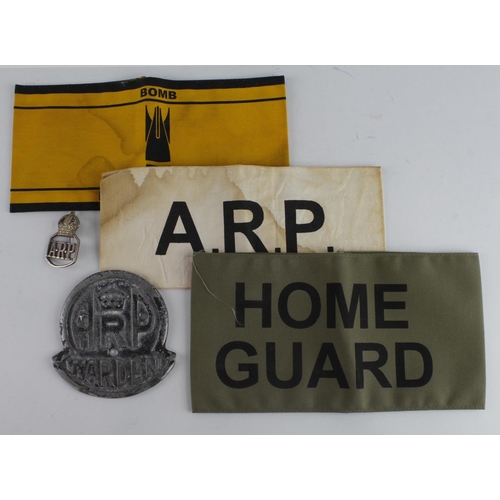 154 - ARP badges and related armbands, the ARP badge a most unusual fretted example.