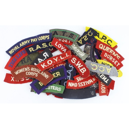 291 - Cloth Badges: British Army shoulder title badges including embroidered, paste back, and slip-on vers... 