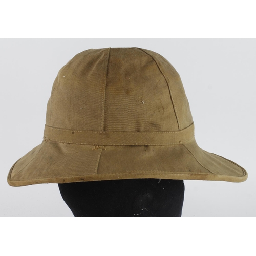 307 - Desert Pith Helmet an early pattern, usually associated with WW1 Indian and African campaigns, marke... 