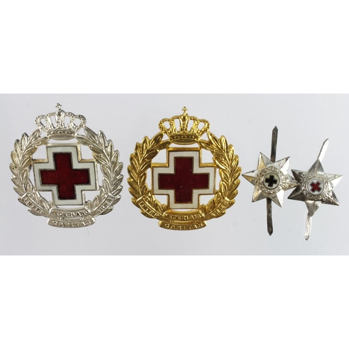 312 - Dutch Red Cross Hat badges (2) gilt & silvered, plus 2 unmarked silver badges/stars.