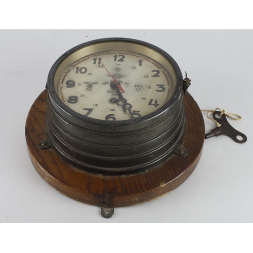 318 - German 3rd Reich Kreigsmarine Clock with key. Dial marked 'Danzig 1939, Torp Kdo Beo Sch' and ' 482 ... 