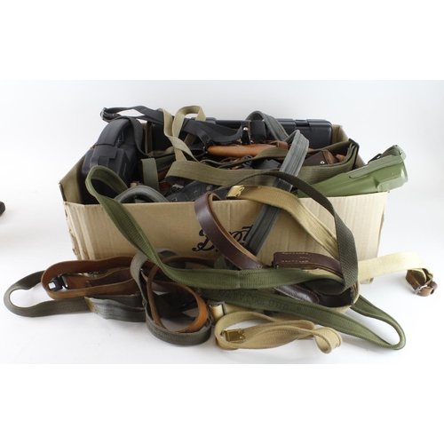 324 - Hugh box of Weapon related items incl Slings, Pouches, Holsters, MG Barrel Case and other items  (Qt... 