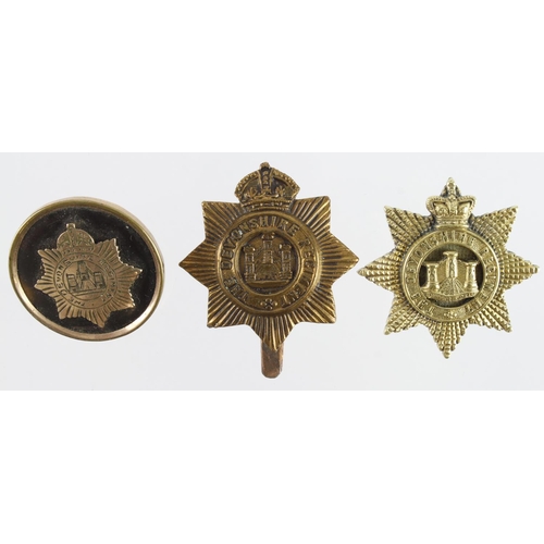 418 - Sweetheart badges comprising an unmarked silver gilt Devonshire Regt. Victorian badge inscribed on t... 