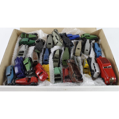 100 - Dinky. A collection of approximately twenty eight early mosty Dinky diecast cars, together with a Sc... 