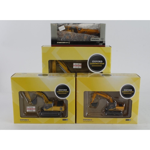 180 - Oxford Diecast. Three boxed Oxford diecast Construction models, comprising Komatsu PC340LC Excavator... 