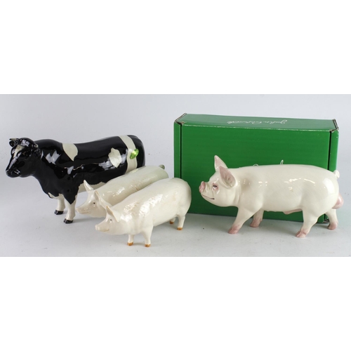 354 - Beswick. Four Beswick figures, comprising Fresian Bull, Middle White Boar, Ch Wall Queen & Ch Wall B... 