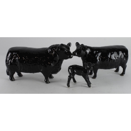 364 - Beswick. Three Beswick figures, comprising Aberdeen Angus Bull, Cow & Calf, tallest 11.5cm approx.