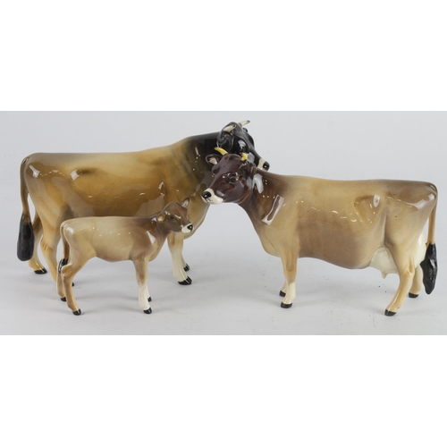 367 - Beswick. Three Beswick figures, comprising Jersey Bull (Dunsley Cowboy), Cow (Newton Tinkle) & Calf,... 