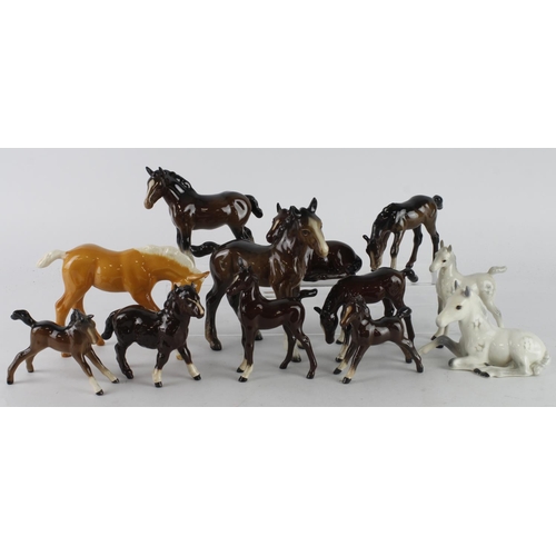 369 - Beswick. Twelve Beswick Foal figures, tallest 15cm approx.