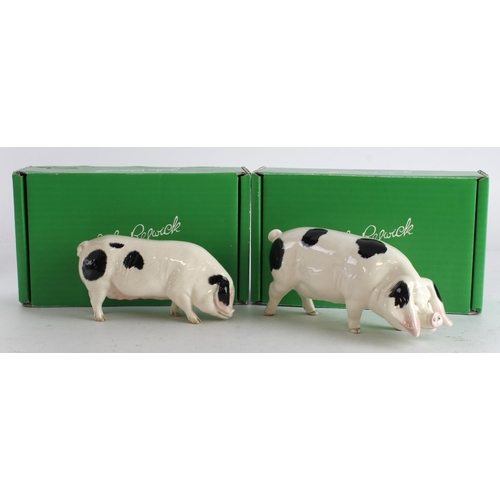 374 - Beswick. Two boxed Beswick Gloucestershire Old Spot Pig figures (4116, G230), tallest 8cm approx.