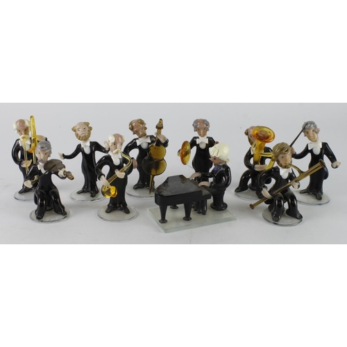 407 - J. Mares Czech glass, depicting ten orchestra members, tallest 90mm approx.