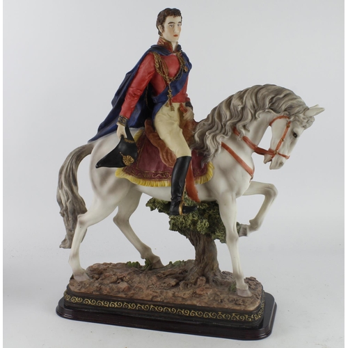 412 - Large figure depicting the Duke of Wellington on horseback, mounted on a wooden plinth, Acedemy labe... 