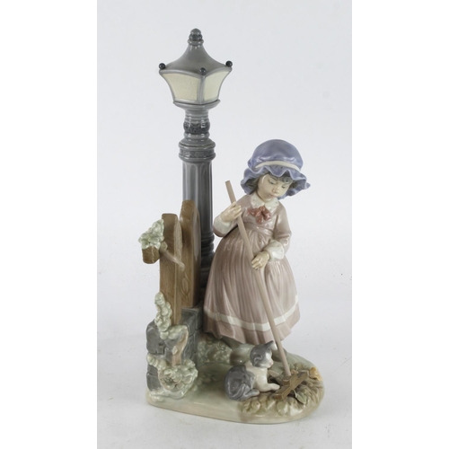 413 - Lladro figure 'Fall Clean Up', depicting a young girl sweeping with a cat watching, makers mark to b... 