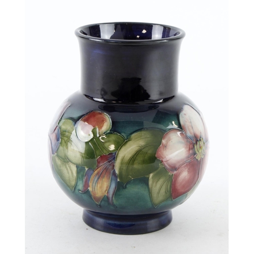 426 - Moorcroft Clematis pattern vase, makers marks to base, height 12.5cm approx.