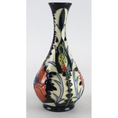 435 - Moorcroft Poppy pattern vase, makers marks to base, height 23.5cm approx.