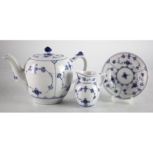 451 - Royal Copenhagen blue fluted teapot, milk jug and small plate, makers marks to base of each, teapot ... 