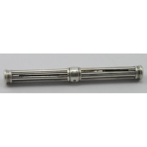 491 - Sampson Mordan & Co. Retractable silver pen, marked S. Mordan & Co., & hallmarked S.M. & Co., London... 