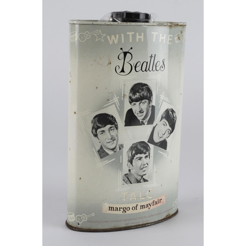 557 - Beatles interest. A tin of talcum powder 'With the Beatles Talc', by Margo of Mayfair, height 18.5cm... 