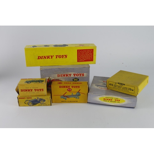 95 - Dinky Toys. Seven boxed Dinky models, including mo. 697 '25 Pounder Field Gun Set'; no. 702 'D.H. Co... 