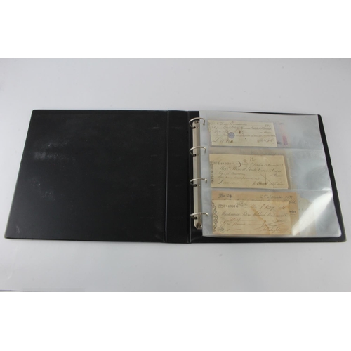 27 - Shares and Cheques (55) 2 albums containing Stocks/Shares etc. (10) and Cheques (45), mainly British... 