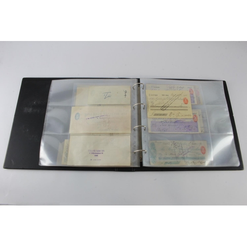 27 - Shares and Cheques (55) 2 albums containing Stocks/Shares etc. (10) and Cheques (45), mainly British... 