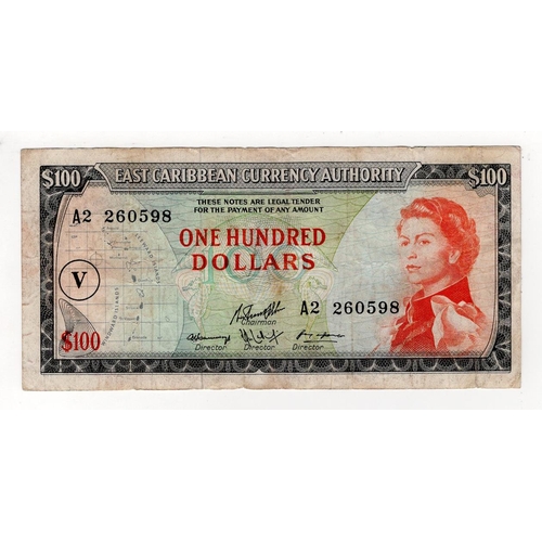 686 - East Caribbean 100 Dollars issued 1965, serial A1 292293 (BNB B104cv, Pick16n) edge nicks, some dirt... 