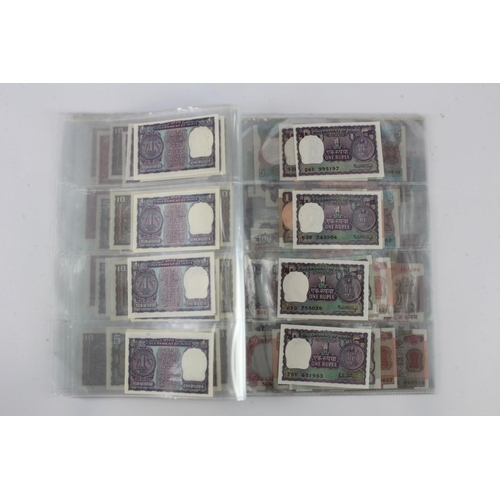 768 - India (80), a high grade group in album pages, 1 Rupee to 100 Rupees 1970's to 1990's, very little d... 