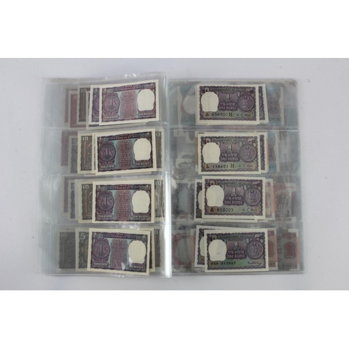 768 - India (80), a high grade group in album pages, 1 Rupee to 100 Rupees 1970's to 1990's, very little d... 